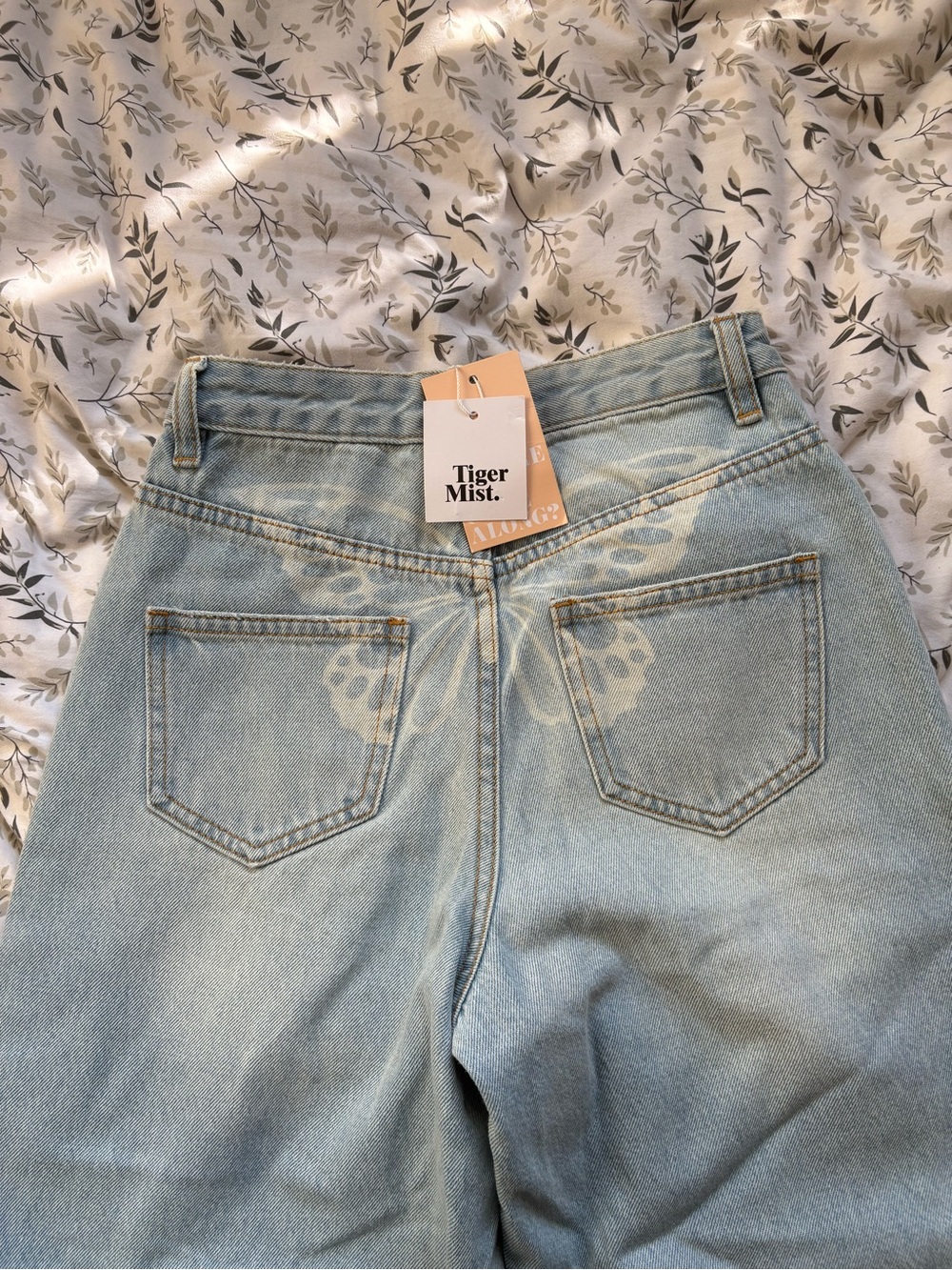 Tiger Mist Light Blue High-Rise Jeans with Bleached Butterfly Back